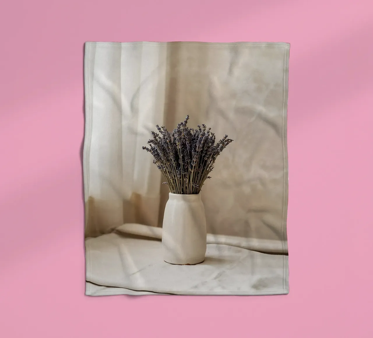 Bouquet of dried lavender in ceramic vase fleece blanket by Casa Limon