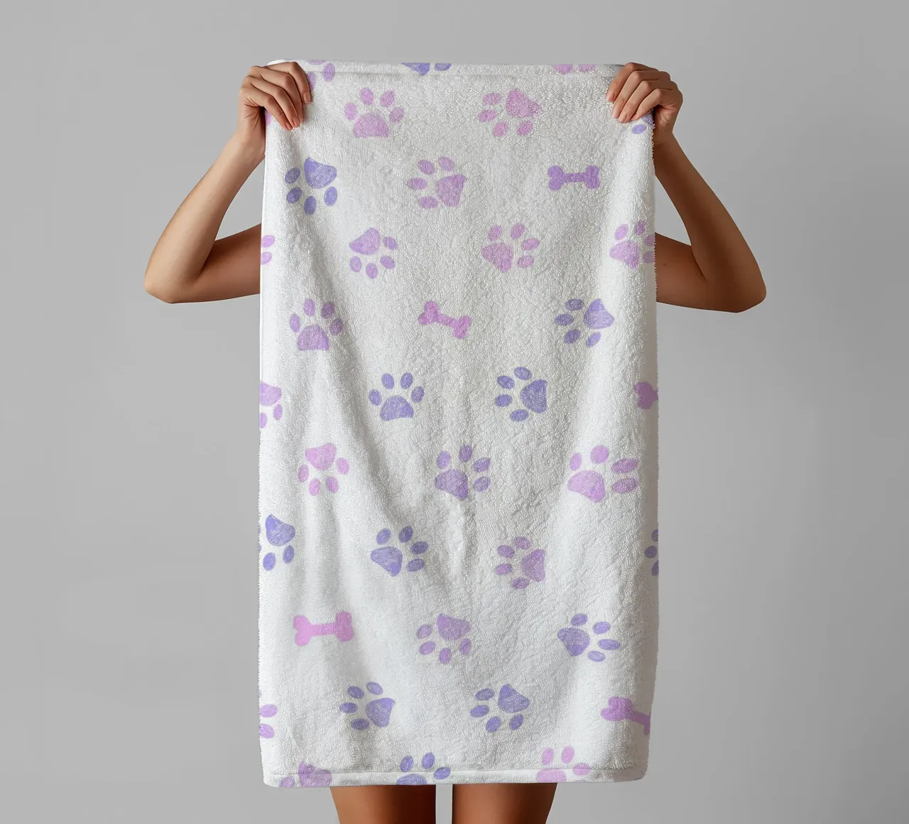 Lilac and pink colored doodles paw prints and bones towel by gulsengunel