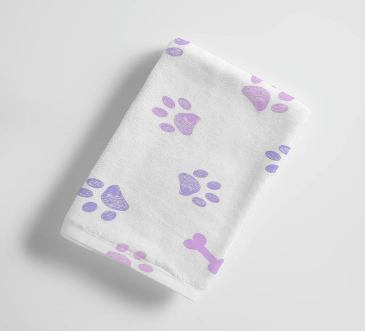 Lilac and pink colored doodles paw prints and bones towel by gulsengunel
