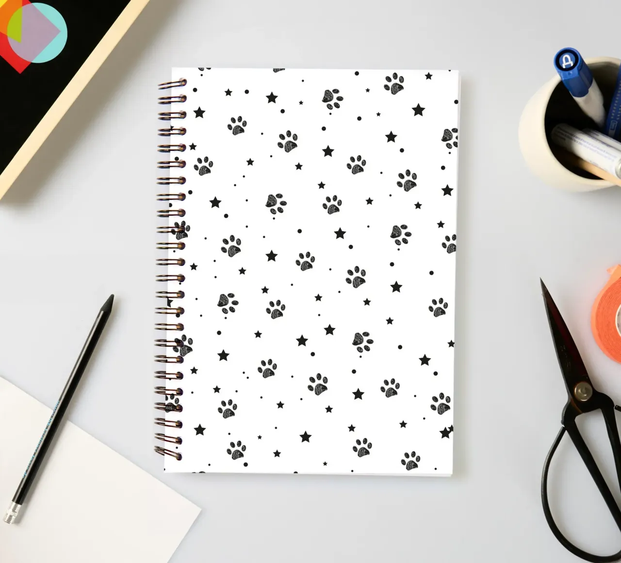 Seamless fabric pattern with paw and stars spiral notebook by gulsengunel