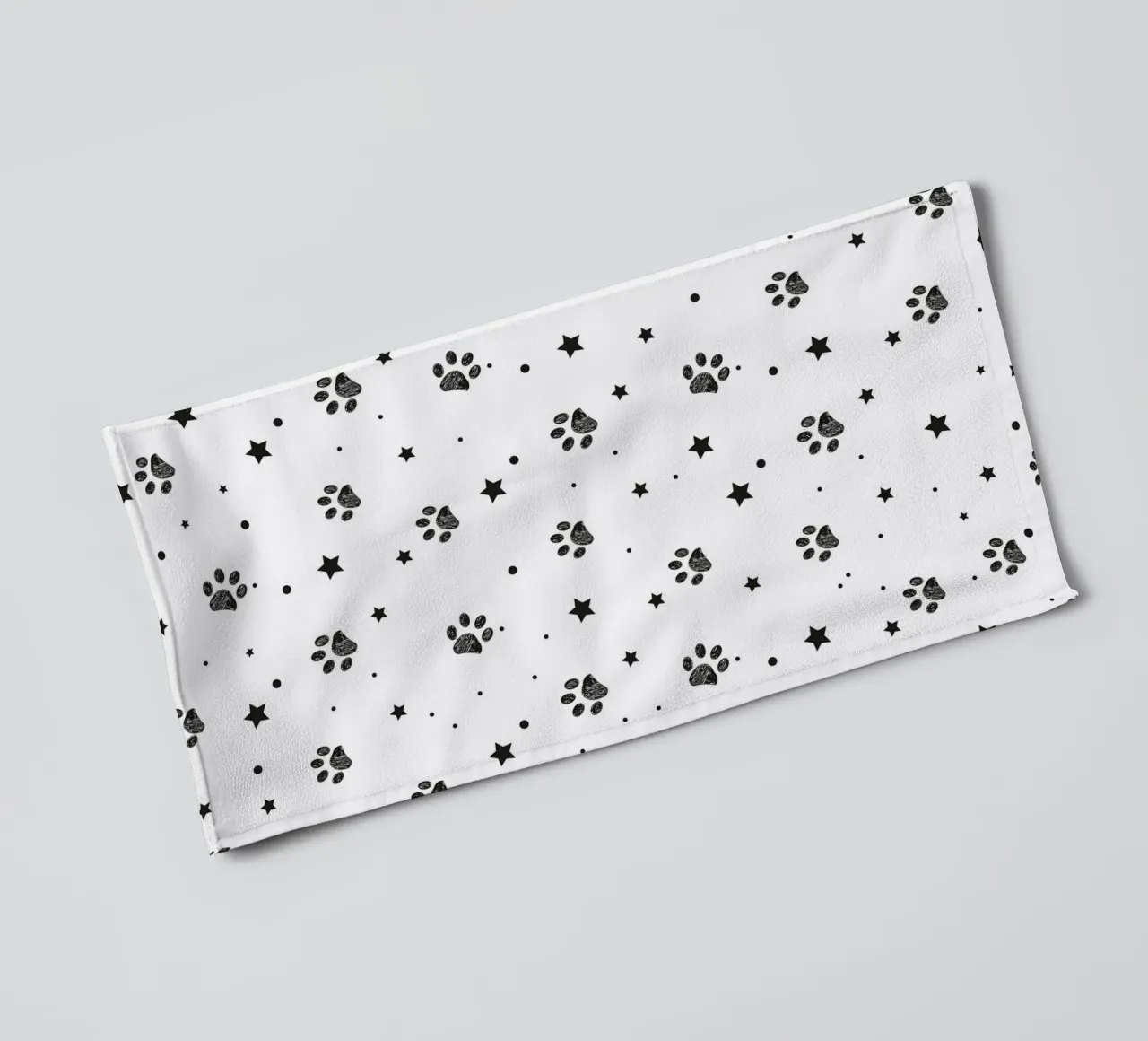 Seamless fabric pattern with paw and stars towel by gulsengunel