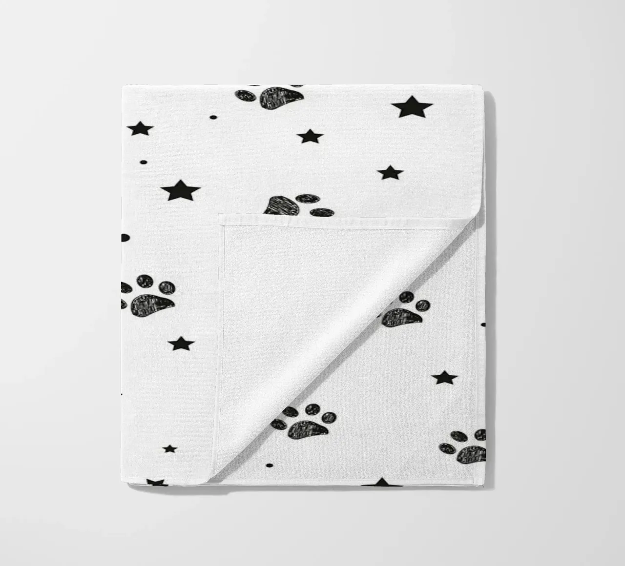 Seamless fabric pattern with paw and stars beach towel by gulsengunel