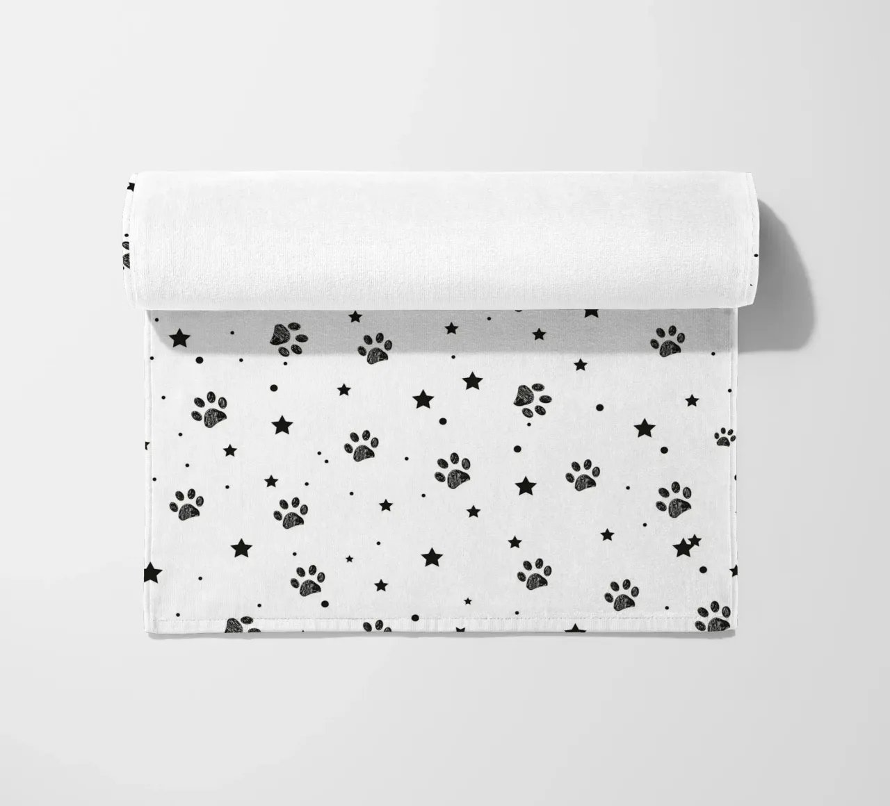 Seamless fabric pattern with paw and stars beach towel by gulsengunel