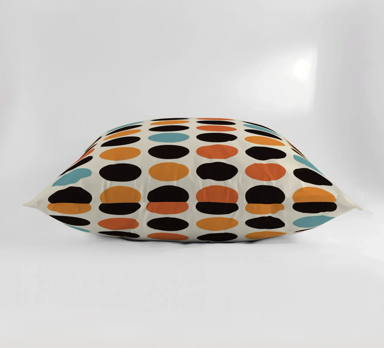 circles pattern decorative cushion by Amber Hughes