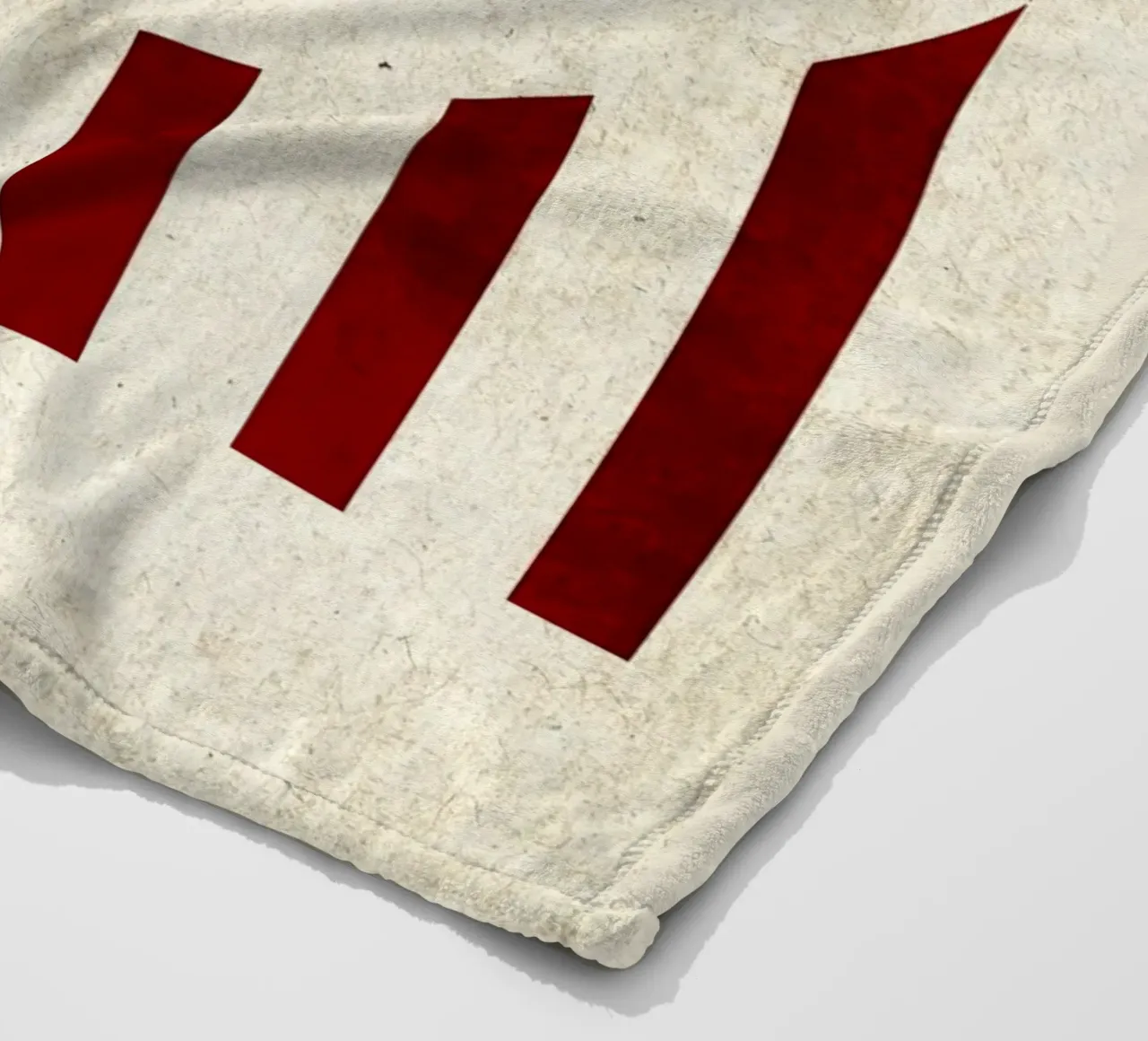Design minimalista degli occhi con strisce rosse coperta in pile da Jason Studio