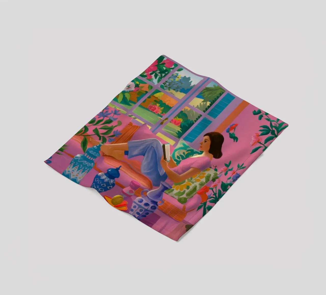 Angolo di lettura inondato di sole coperta in pile da Veil Maya
