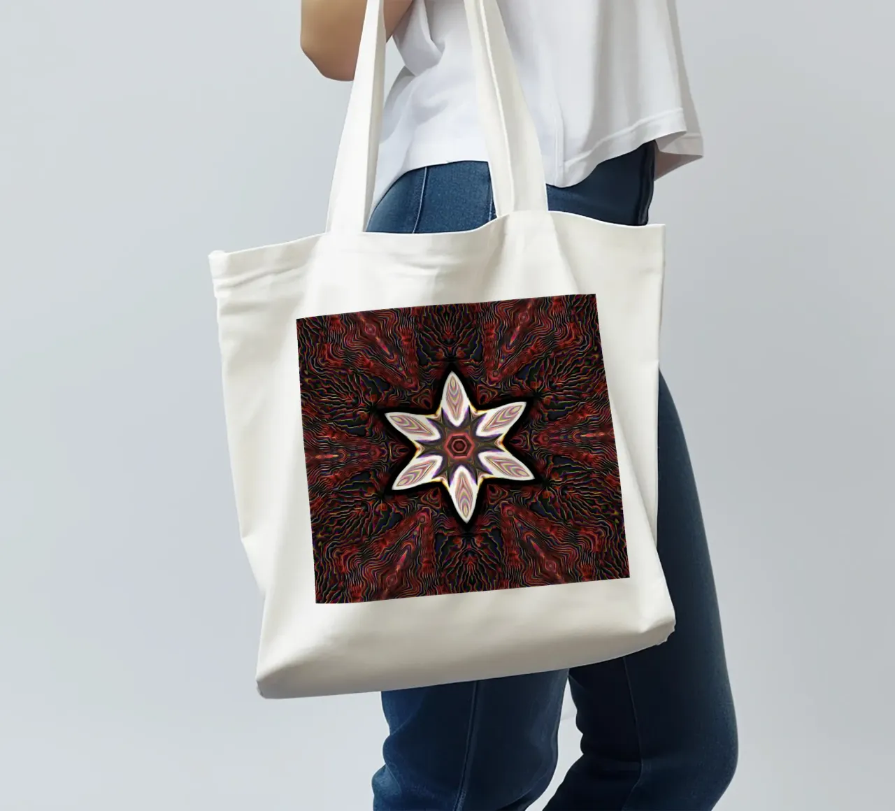Bright star on textured reddish dark background tote bag by Gürsel Yesil Digital Art