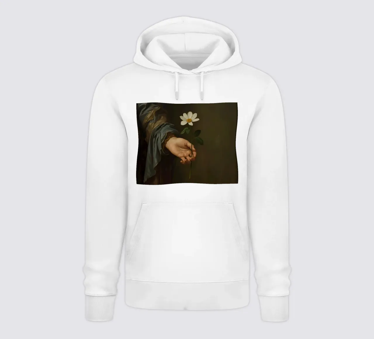 Mano che regge un fiore bianco in una luce soffusa con felpa con cappuccio da DesignDoodle