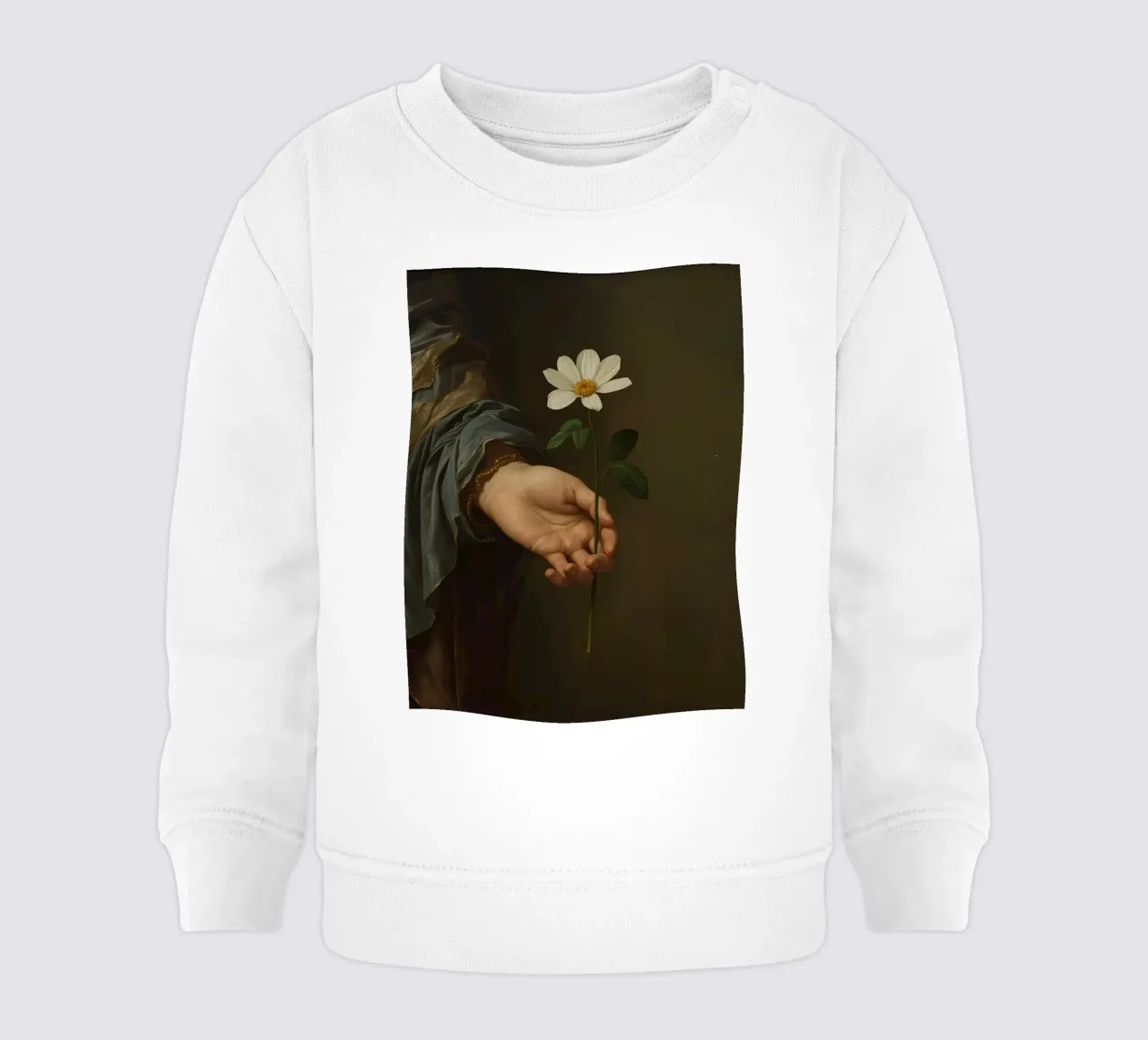 Mano che regge un fiore bianco in una luce soffusa con felpa neonato da DesignDoodle