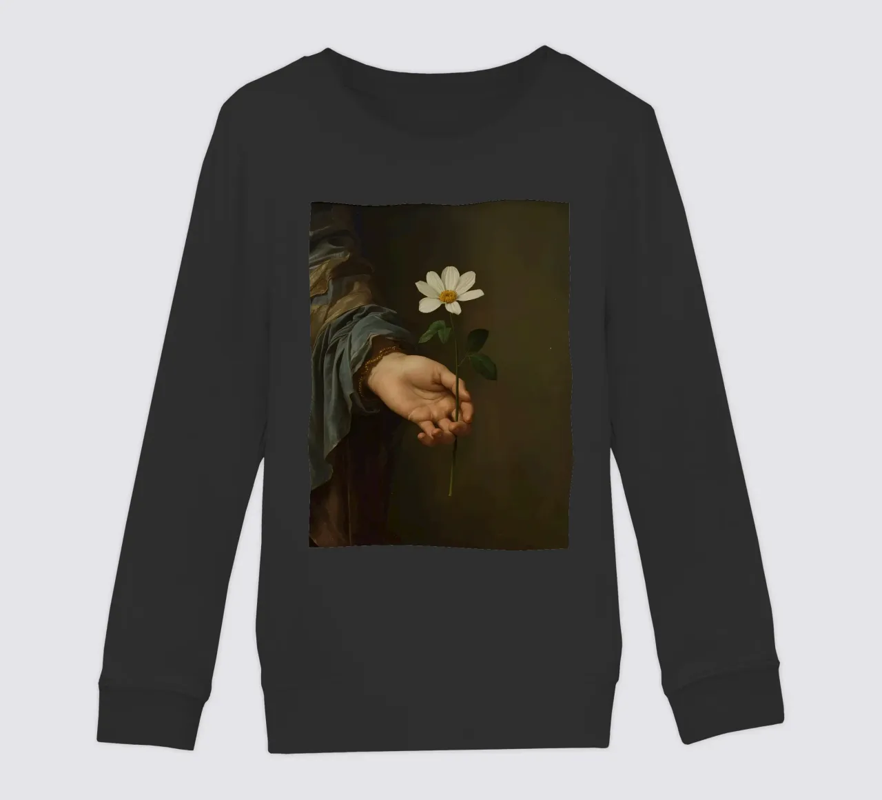 Mano che regge un fiore bianco in una luce soffusa con felpa bambino da DesignDoodle