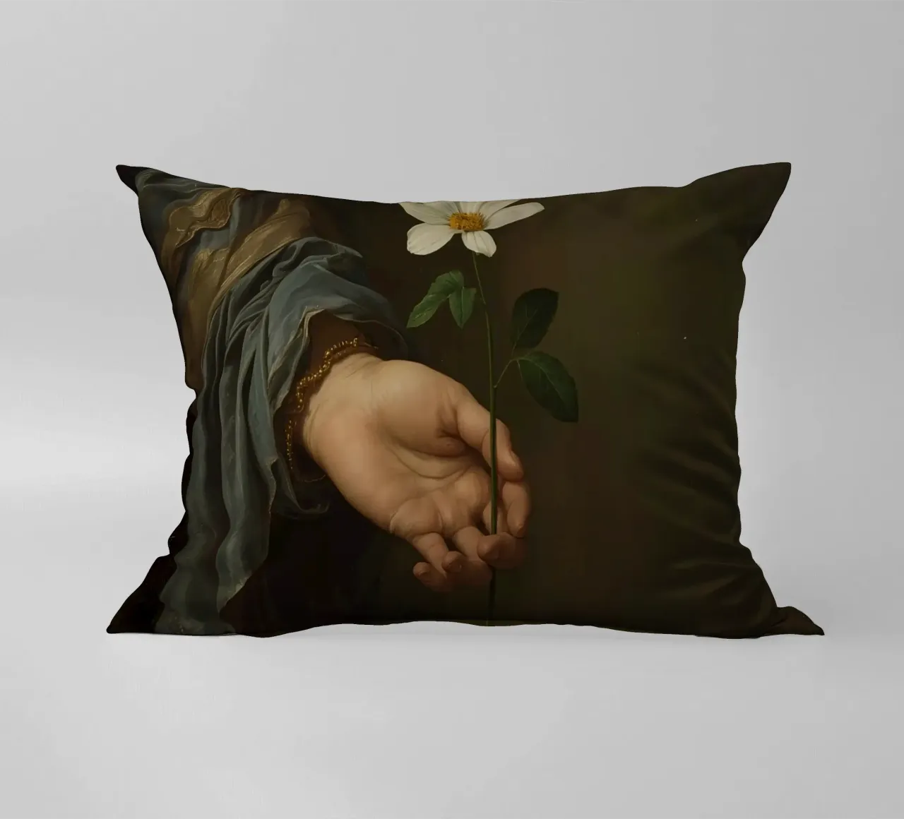 Mano che regge un fiore bianco in una luce soffusa con cuscino da DesignDoodle