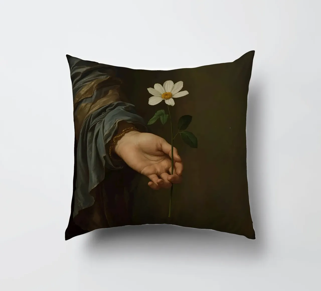 Mano che regge un fiore bianco in una luce soffusa con cuscino da DesignDoodle