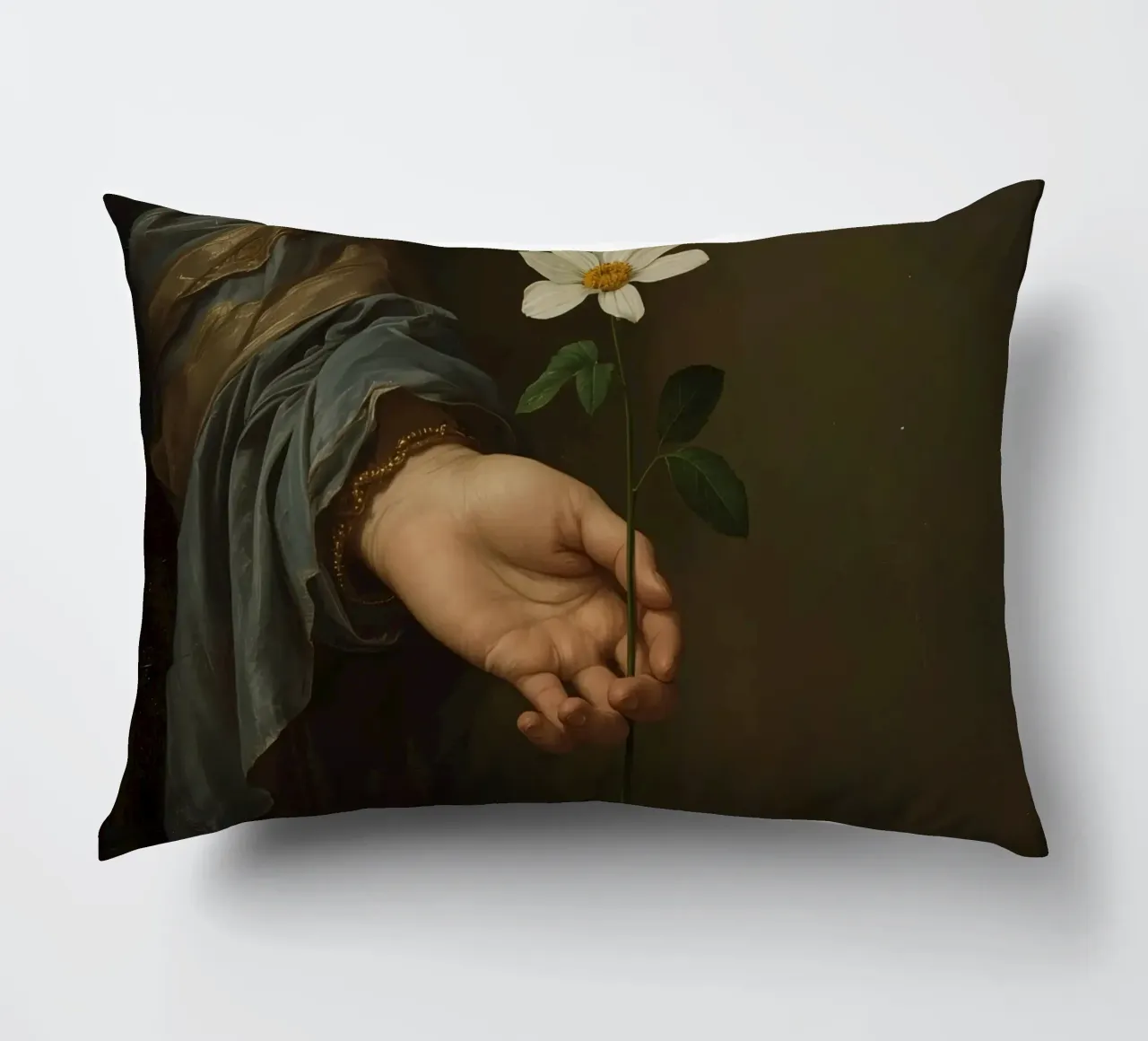 Mano che regge un fiore bianco in una luce soffusa con cuscino da DesignDoodle