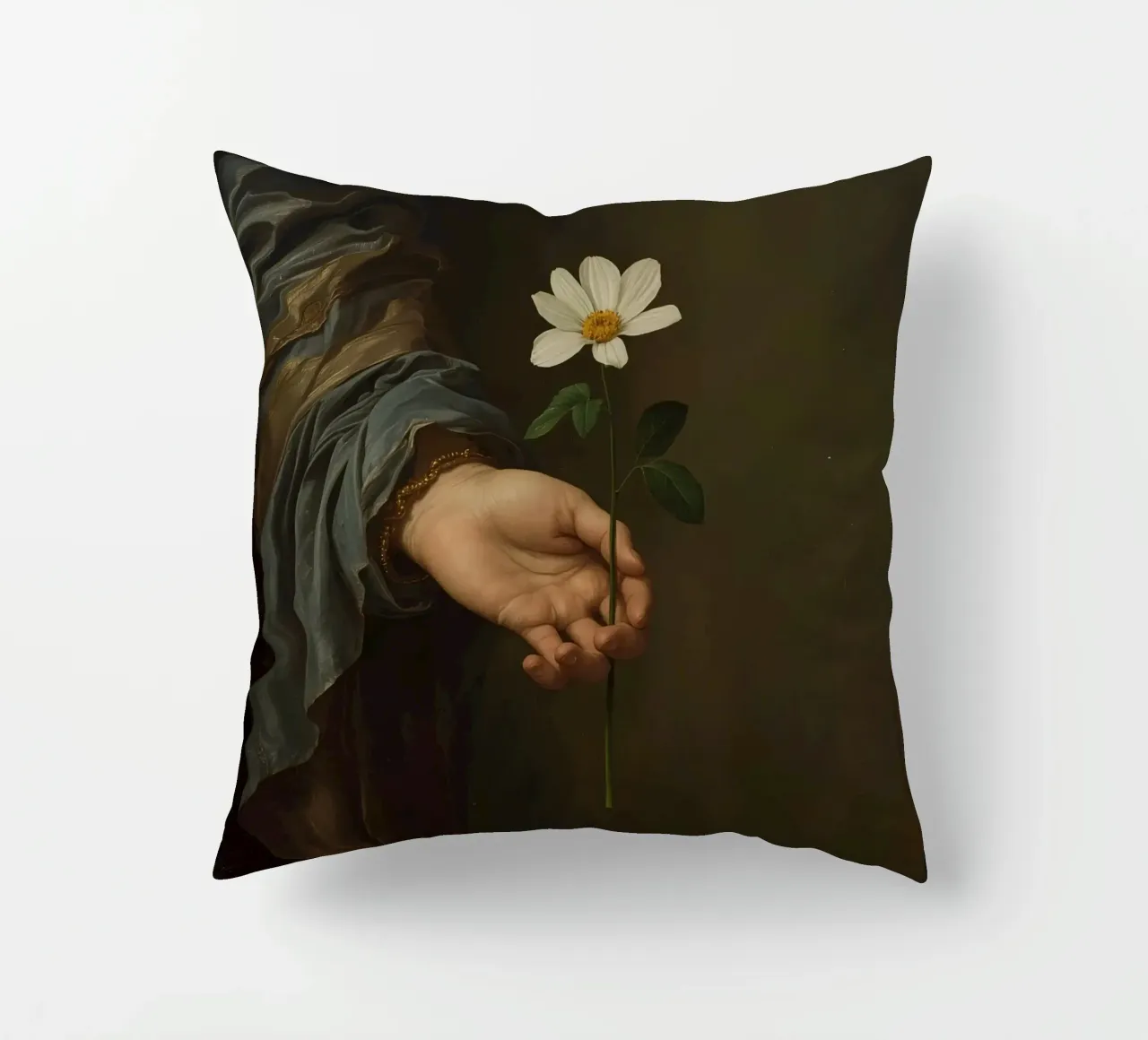 Mano che regge un fiore bianco in una luce soffusa con cuscino da DesignDoodle