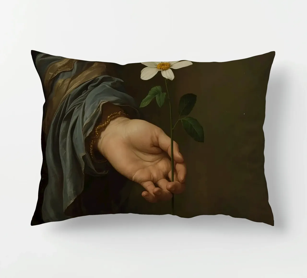 Mano che regge un fiore bianco in una luce soffusa con cuscino da DesignDoodle