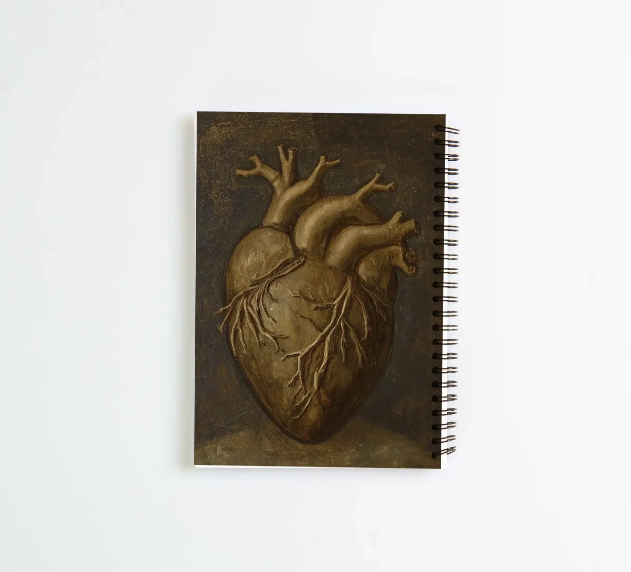 Human heart with tree-like structures in a dark background spiral notebook by DesignDoodle