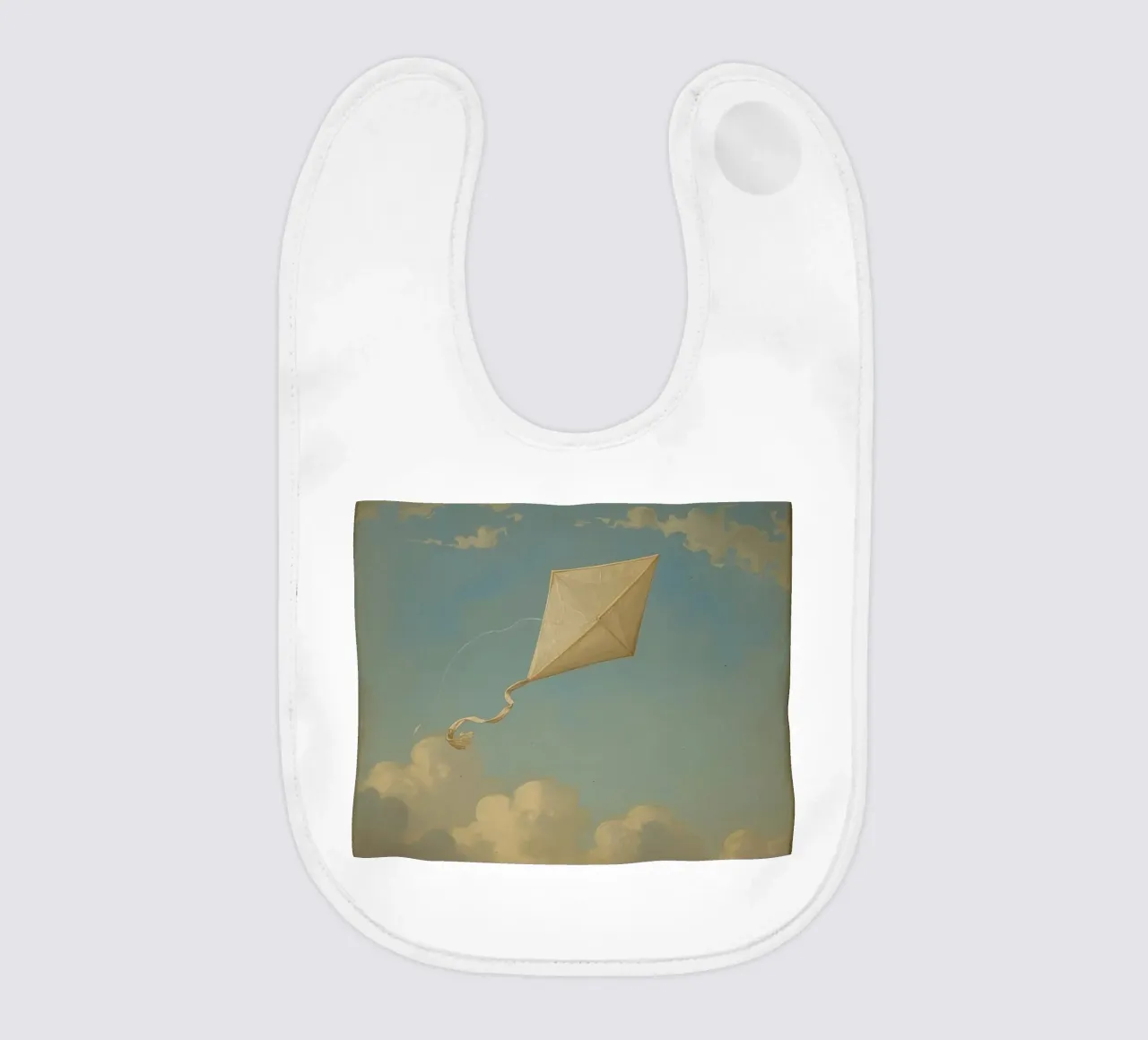 Un aquilone che vola alto danza tra le nuvole in un cielo azzurro e limpido bavaglino da DesignDoodle