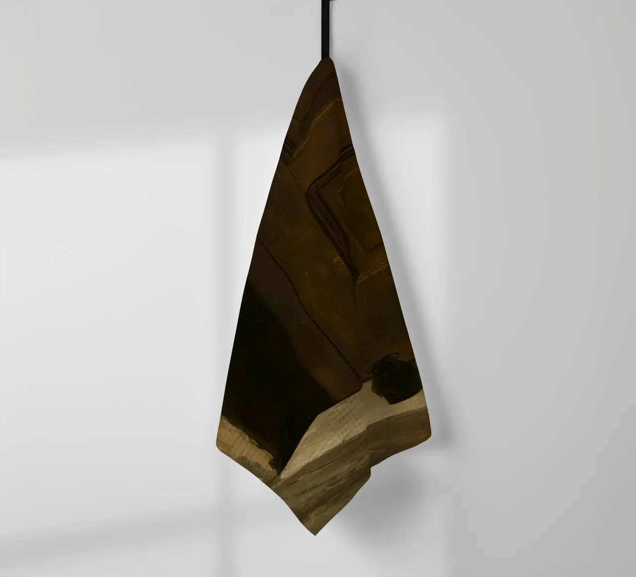 Doorway with black shoes resting on a concrete step under so tea towel by DesignDoodle