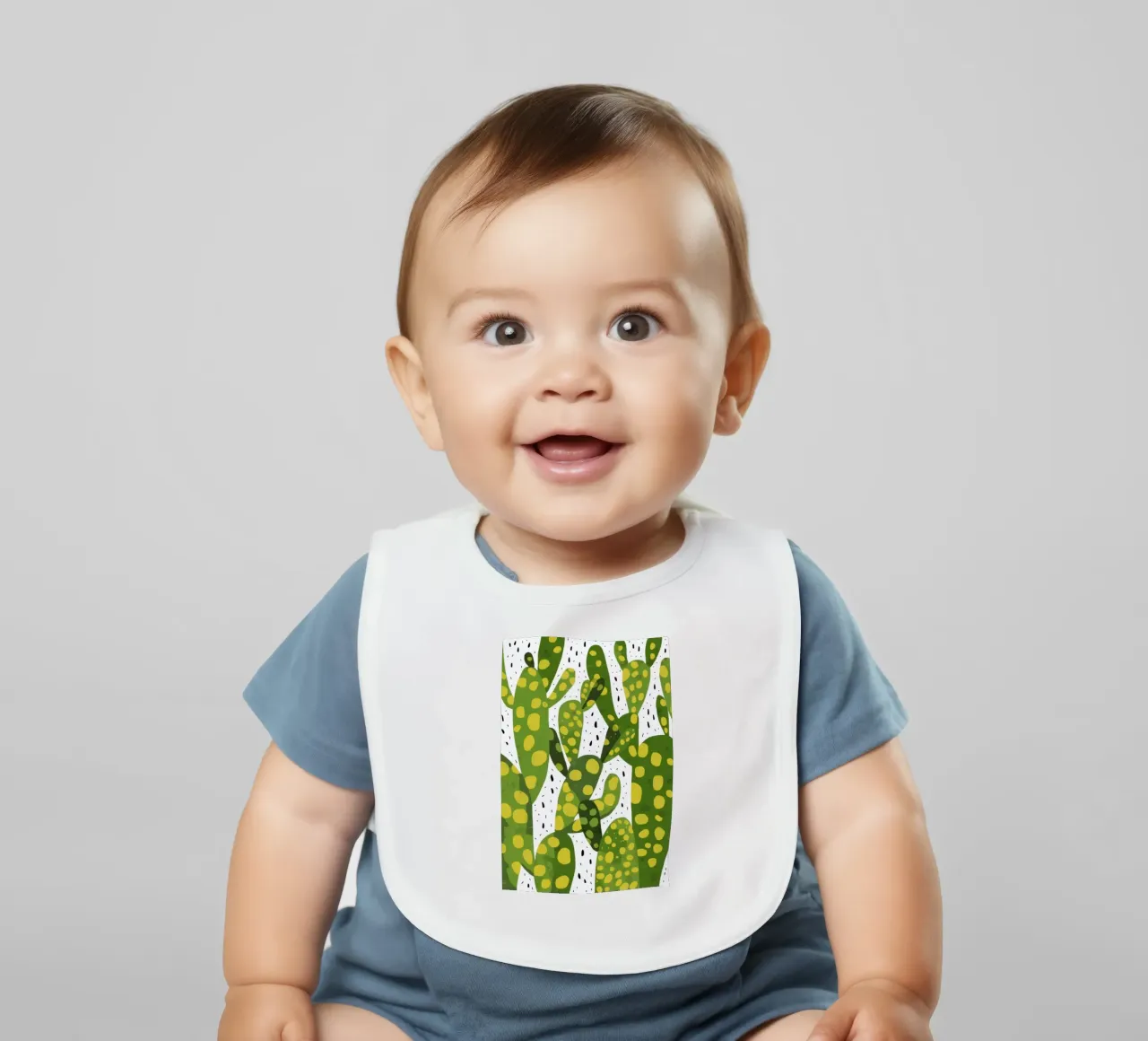 Vibrant Cactus Pattern baby bib by Bring Haven