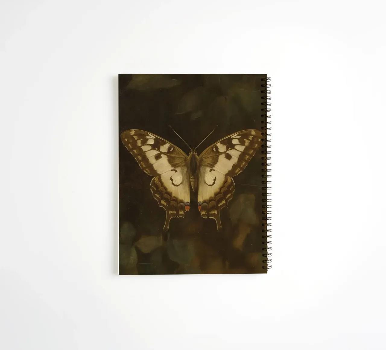 Butterfly resting on dark foliage with intricate patterns spiral notebook by DesignDoodle