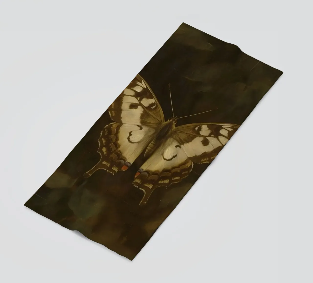 Butterfly resting on dark foliage with intricate patterns beach towel by DesignDoodle