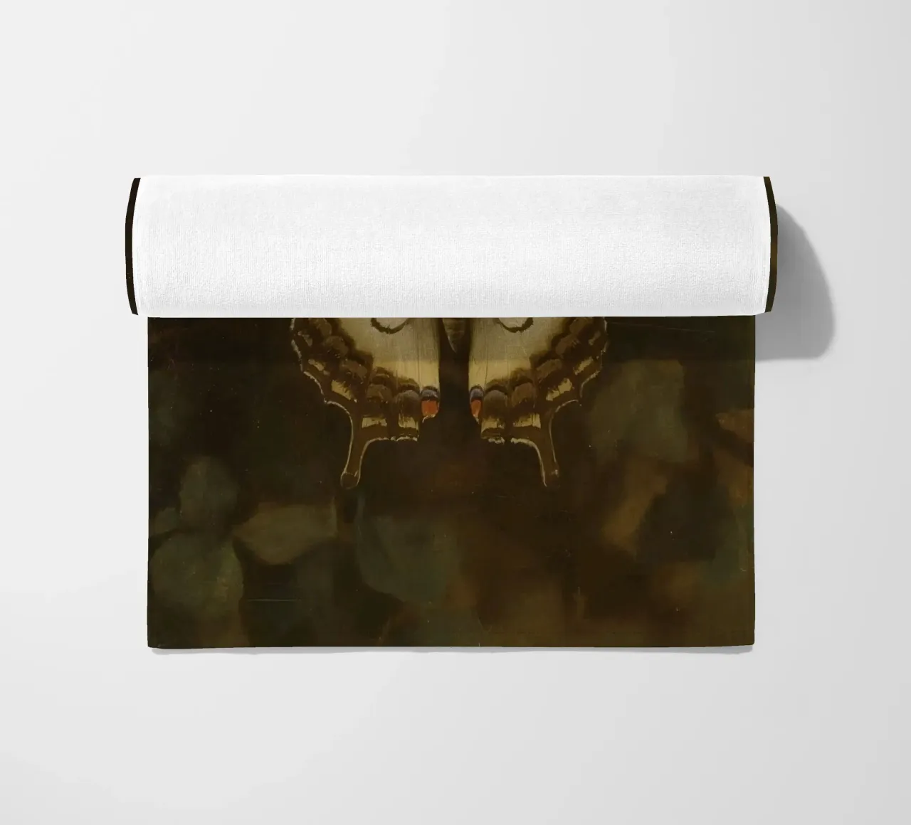 Butterfly resting on dark foliage with intricate patterns beach towel by DesignDoodle