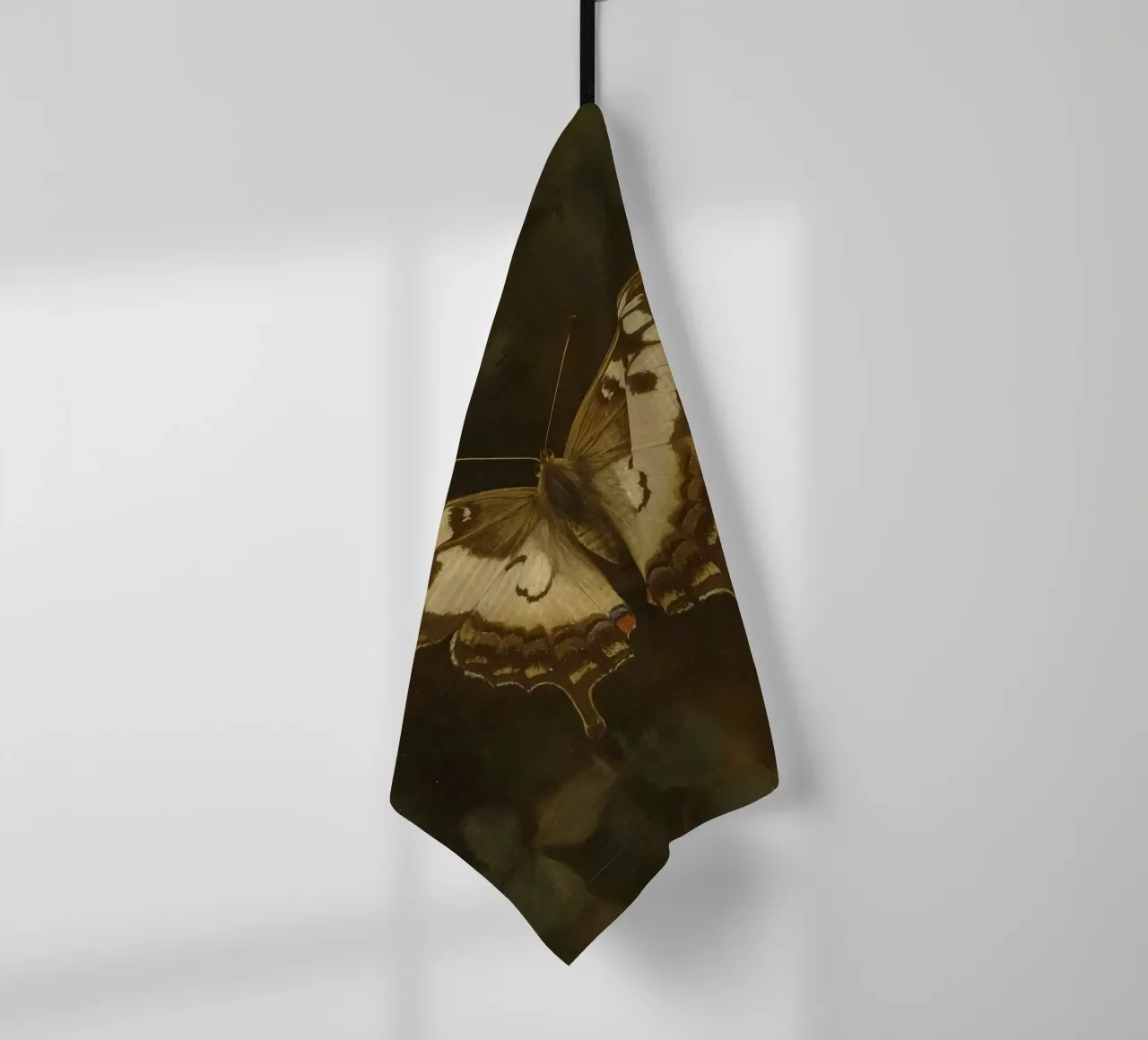 Butterfly resting on dark foliage with intricate patterns tea towel by DesignDoodle