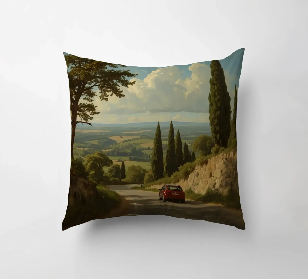 Superbe vue de la campagne avec une voiture roulant le long d'une route sinueuse. coussin de DesignDoodle