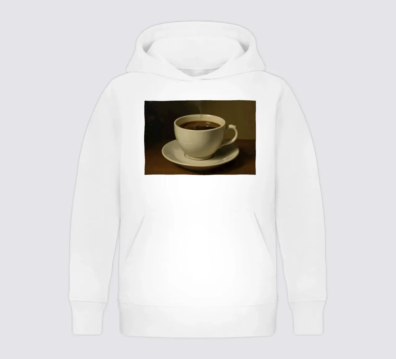 Tazza da caffè con vapore appoggiata su un piattino in un ambiente caldo felpa bambino con cappuccio da DesignDoodle