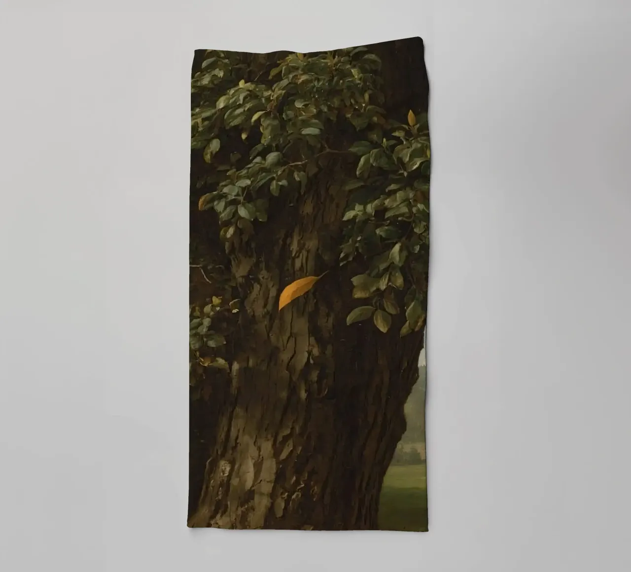 Majestic tree stands tall in a landscape with distant hills towel by DesignDoodle
