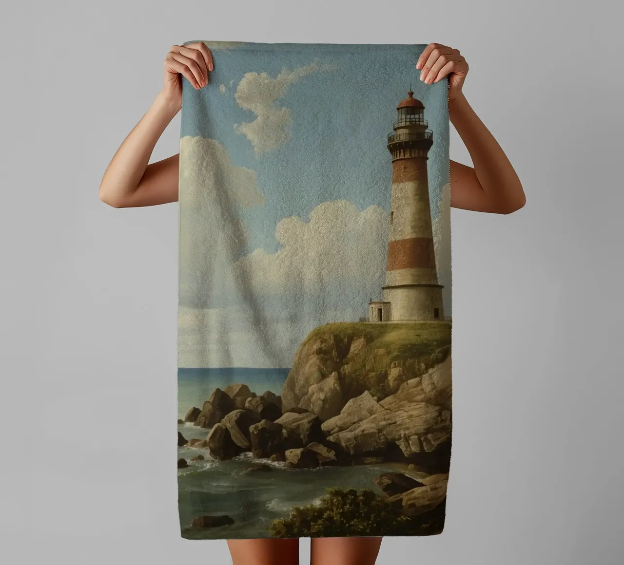 Lighthouse perched on a rocky cliff overlooking the ocean towel by DesignDoodle