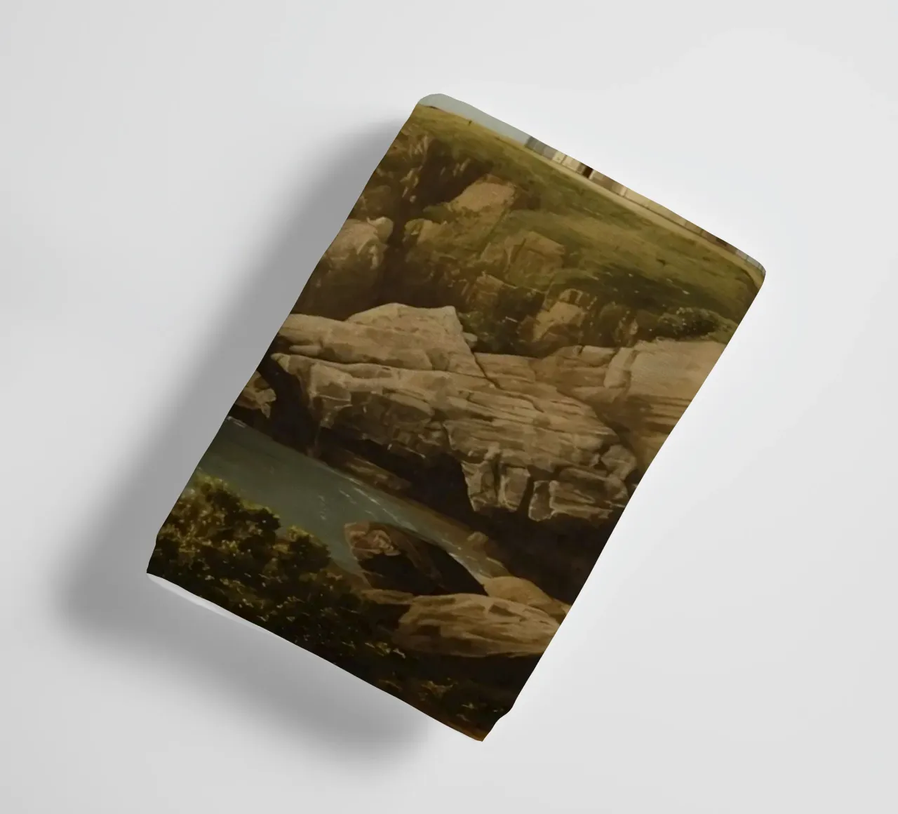 Lighthouse perched on a rocky cliff overlooking the ocean towel by DesignDoodle