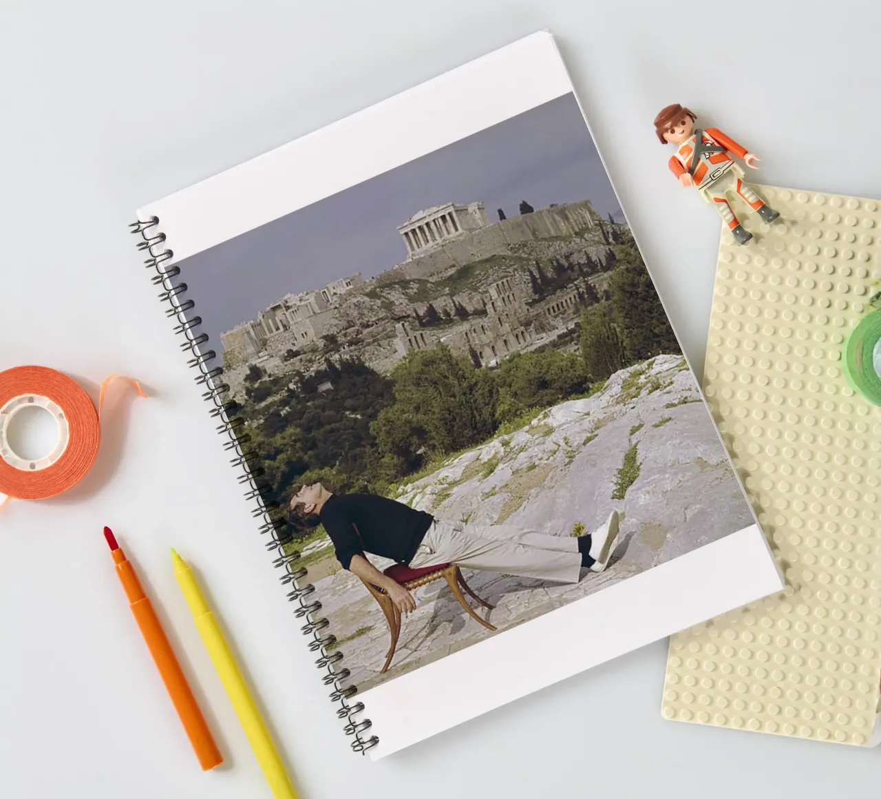 Slim Aarons - Sit In A Lounge Chair spiral notebook by The Poster UK