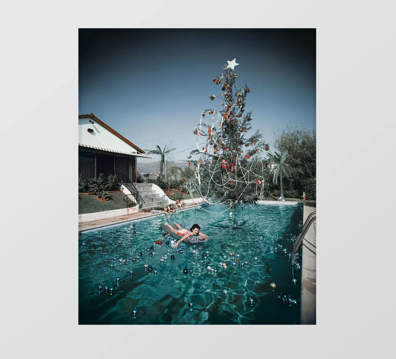 Slim Aarons - Woman Swimming pvc cover by The Poster UK
