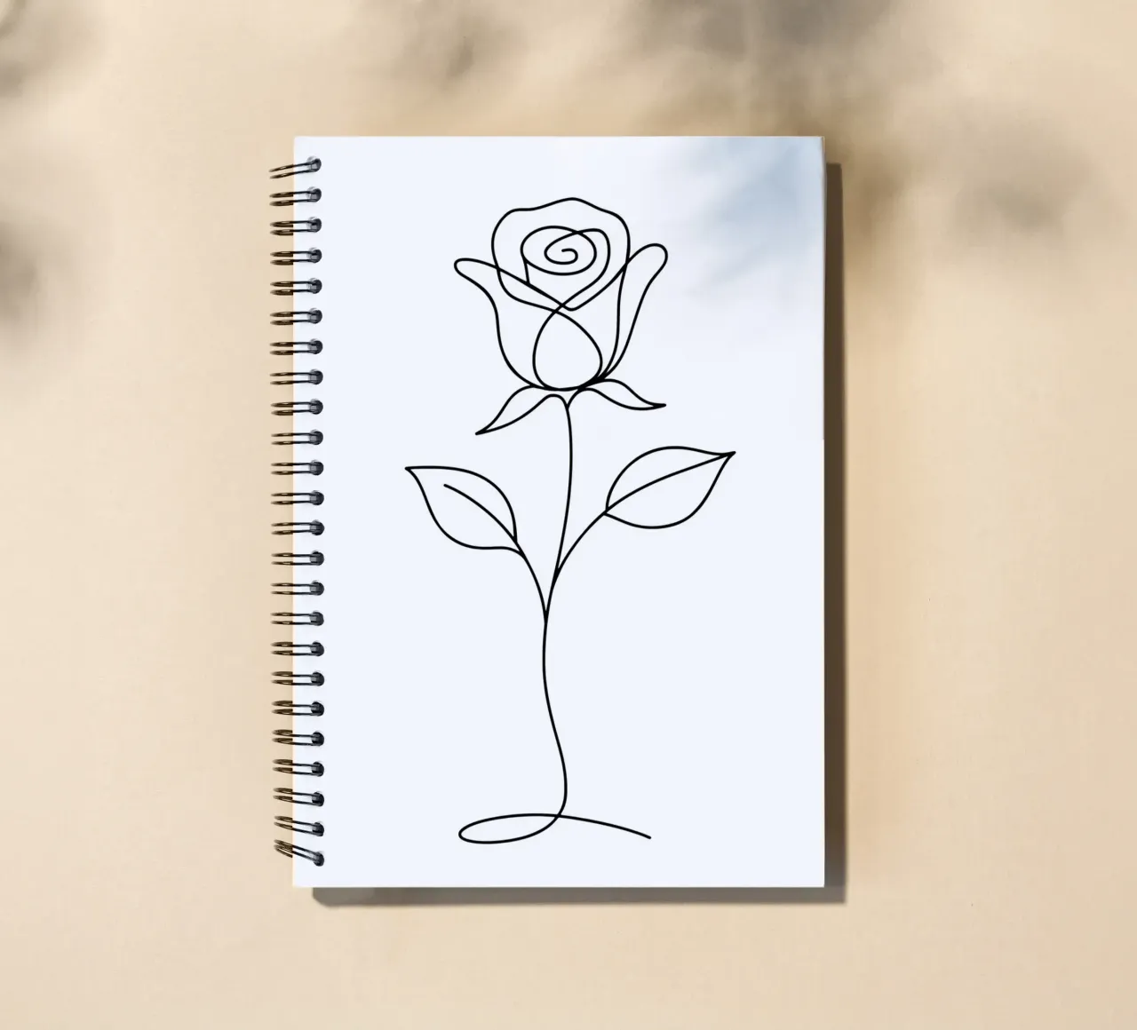 Una linea di fiori di rosa in fiore minimale diario ad anelli da Attaboy Dsgn