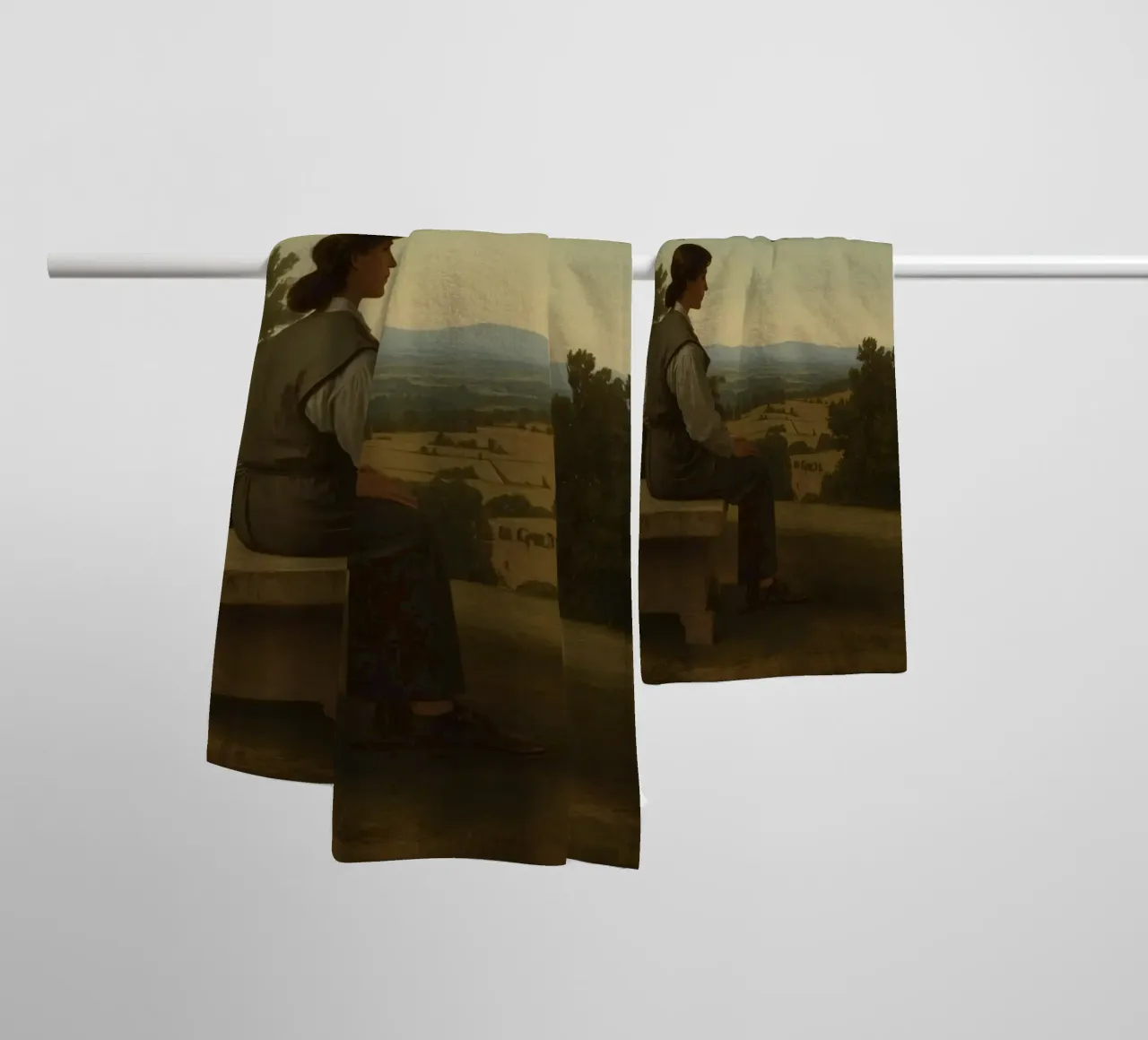 man seated on a stone bench reflecting on a landscape towel by DesignDoodle