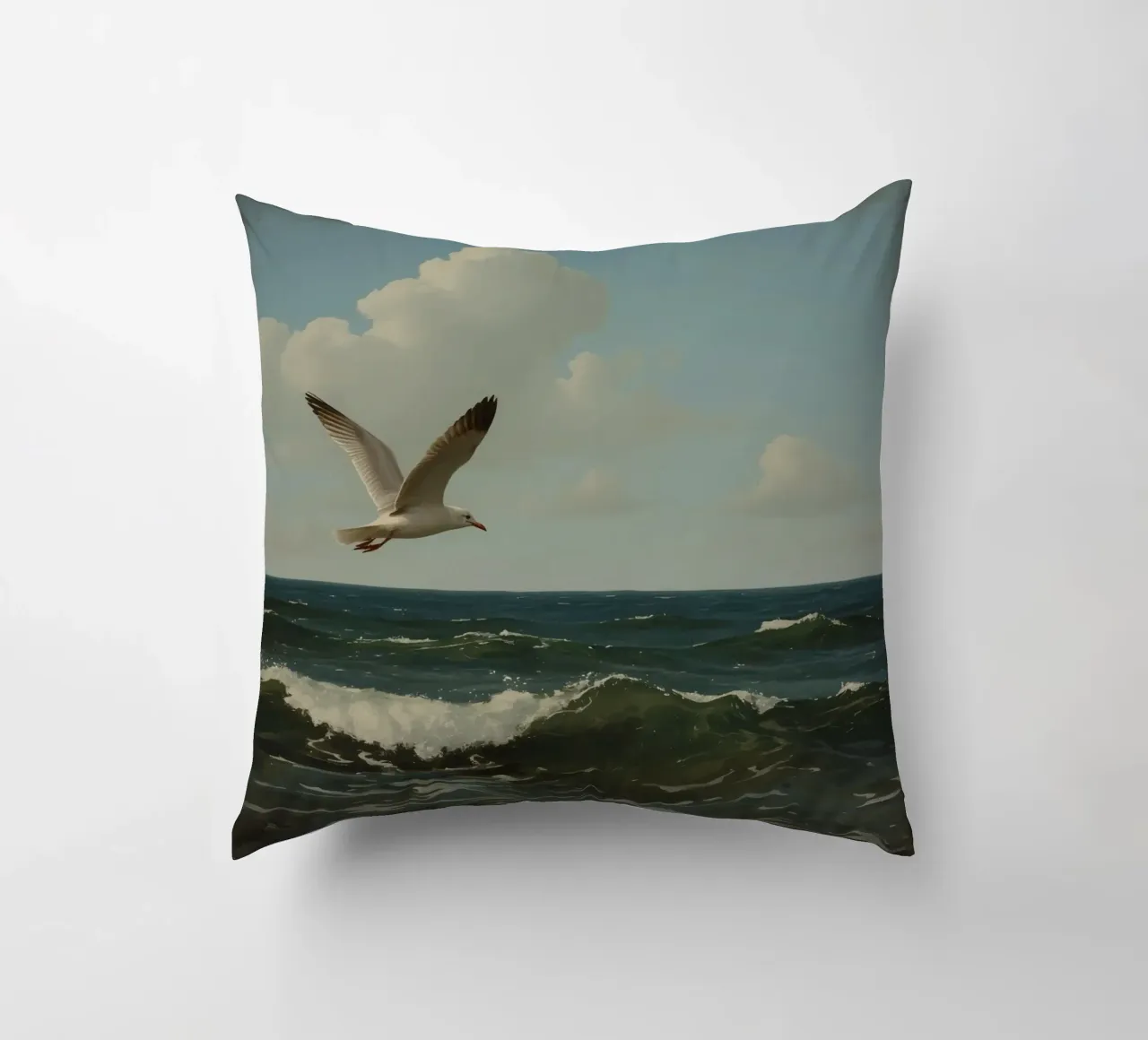 Seagull gliding over ocean waves under a partly cloudy sky decorative cushion by DesignDoodle
