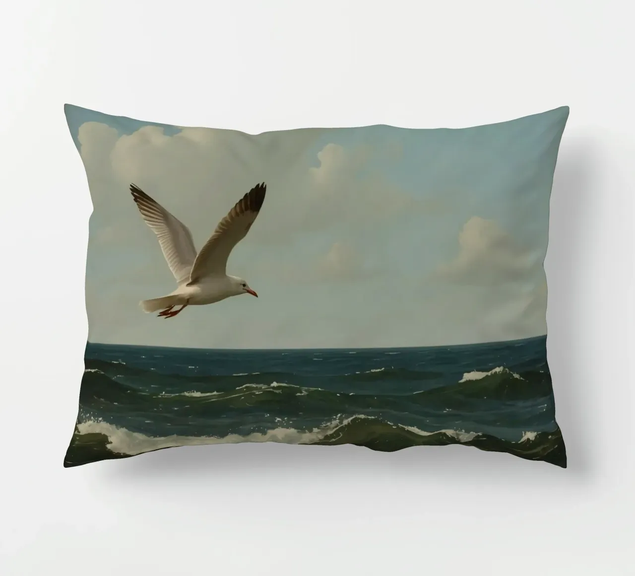 Seagull gliding over ocean waves under a partly cloudy sky decorative cushion by DesignDoodle