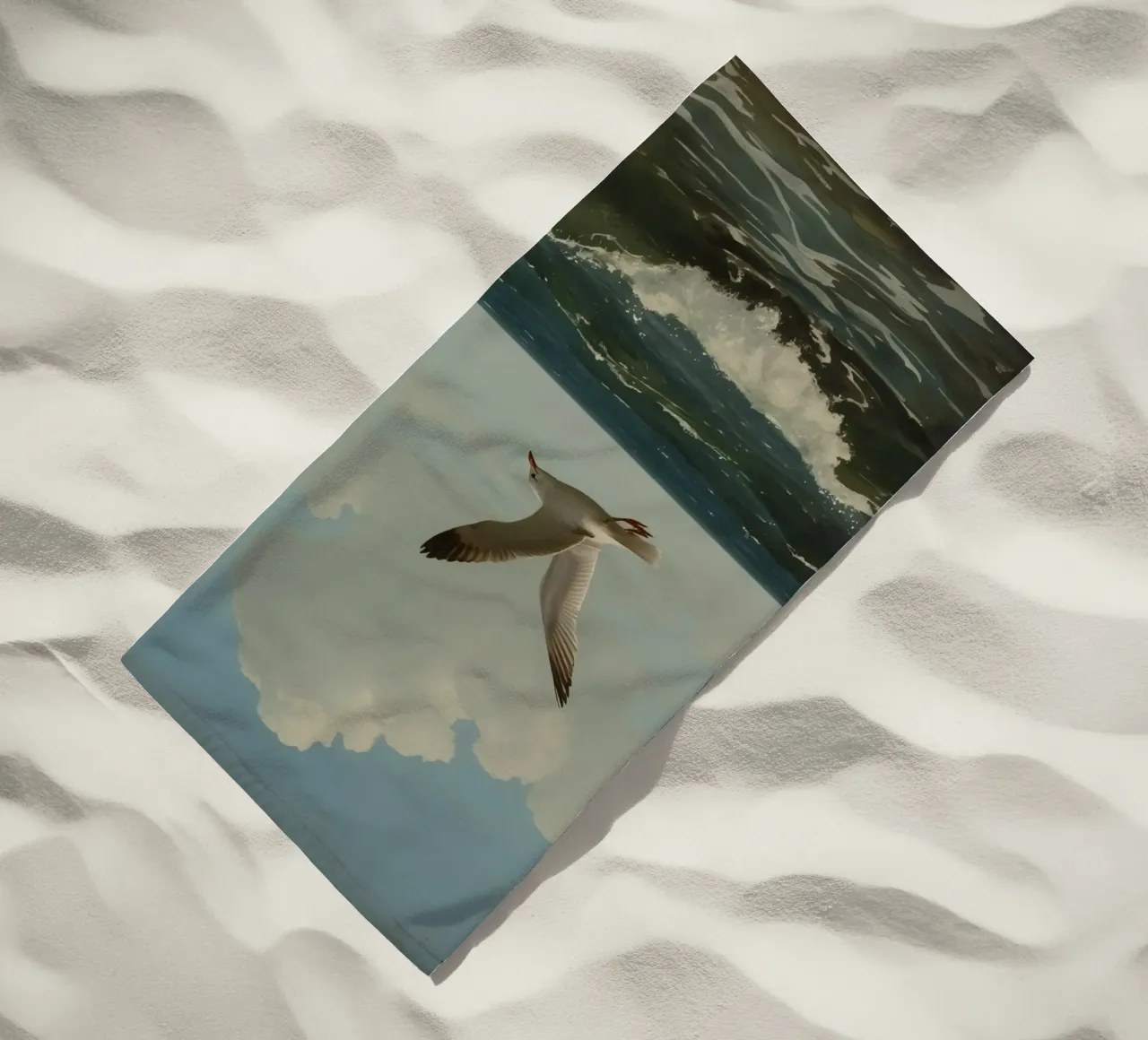 Seagull gliding over ocean waves under a partly cloudy sky beach towel by DesignDoodle