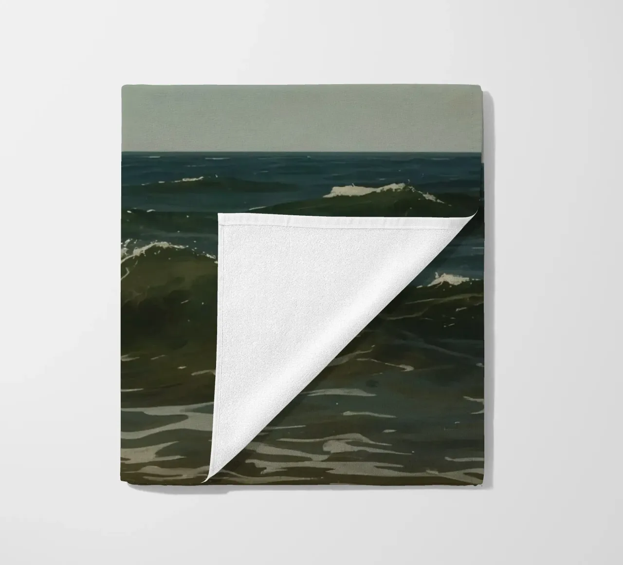 Seagull gliding over ocean waves under a partly cloudy sky beach towel by DesignDoodle