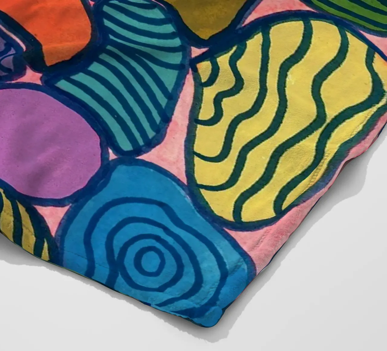 Pietre colorate a motivo coperta in pile da Nica Colorie