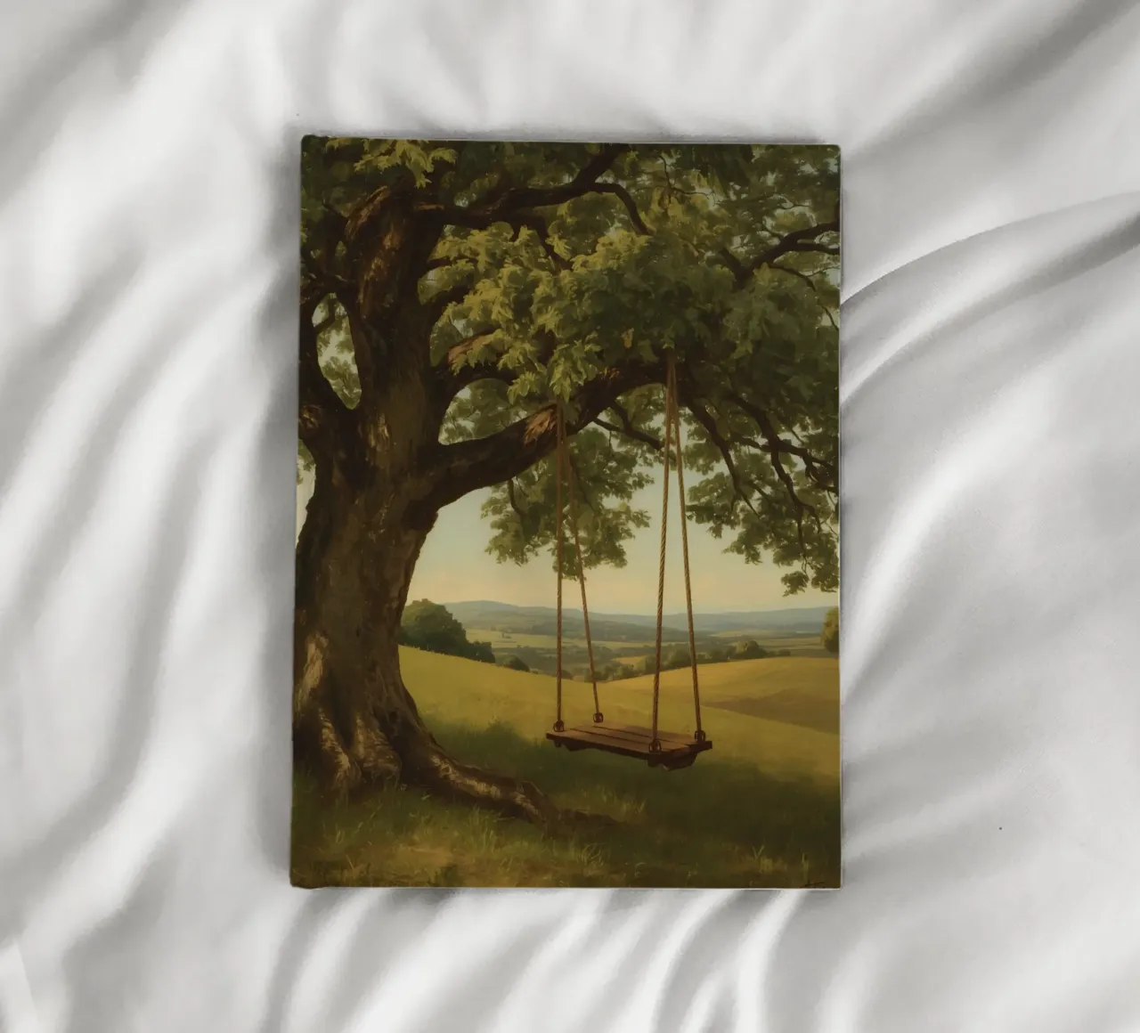 Swing hanging from a large tree overlooking rolling hills notebook by DesignDoodle