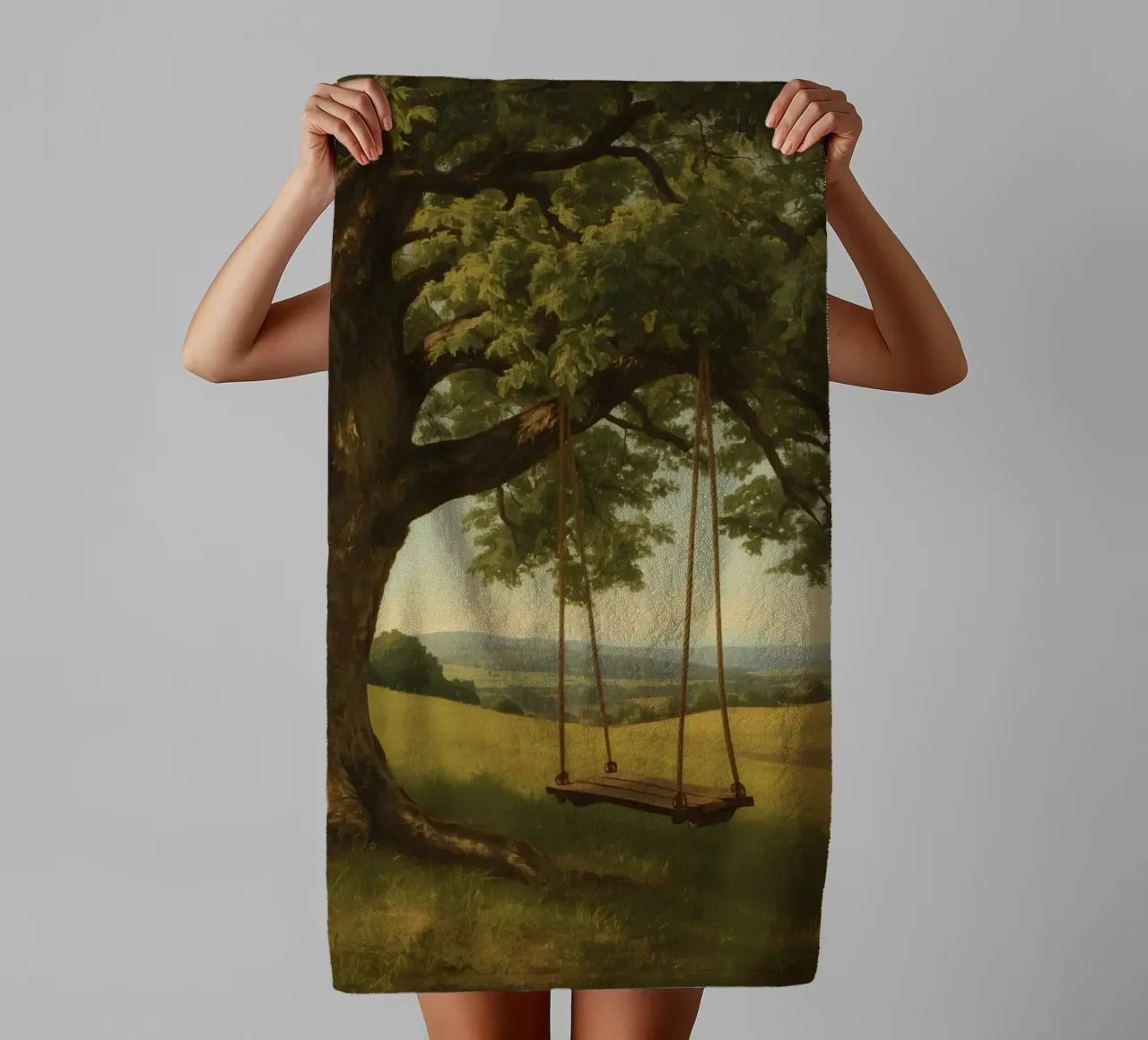 Swing hanging from a large tree overlooking rolling hills towel by DesignDoodle