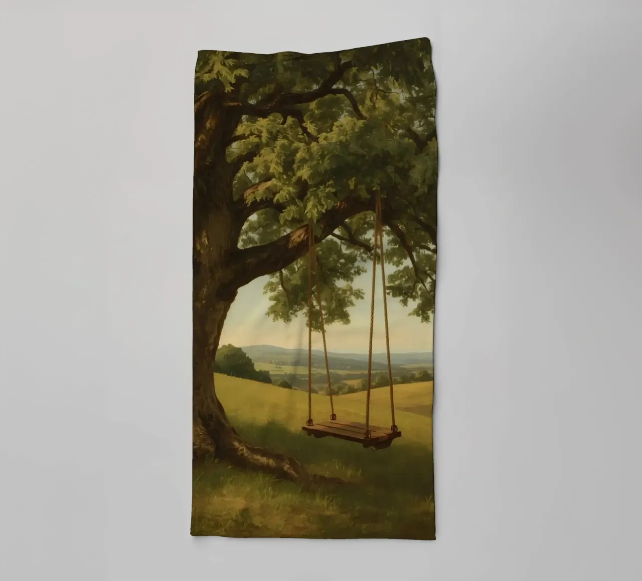 Swing hanging from a large tree overlooking rolling hills towel by DesignDoodle