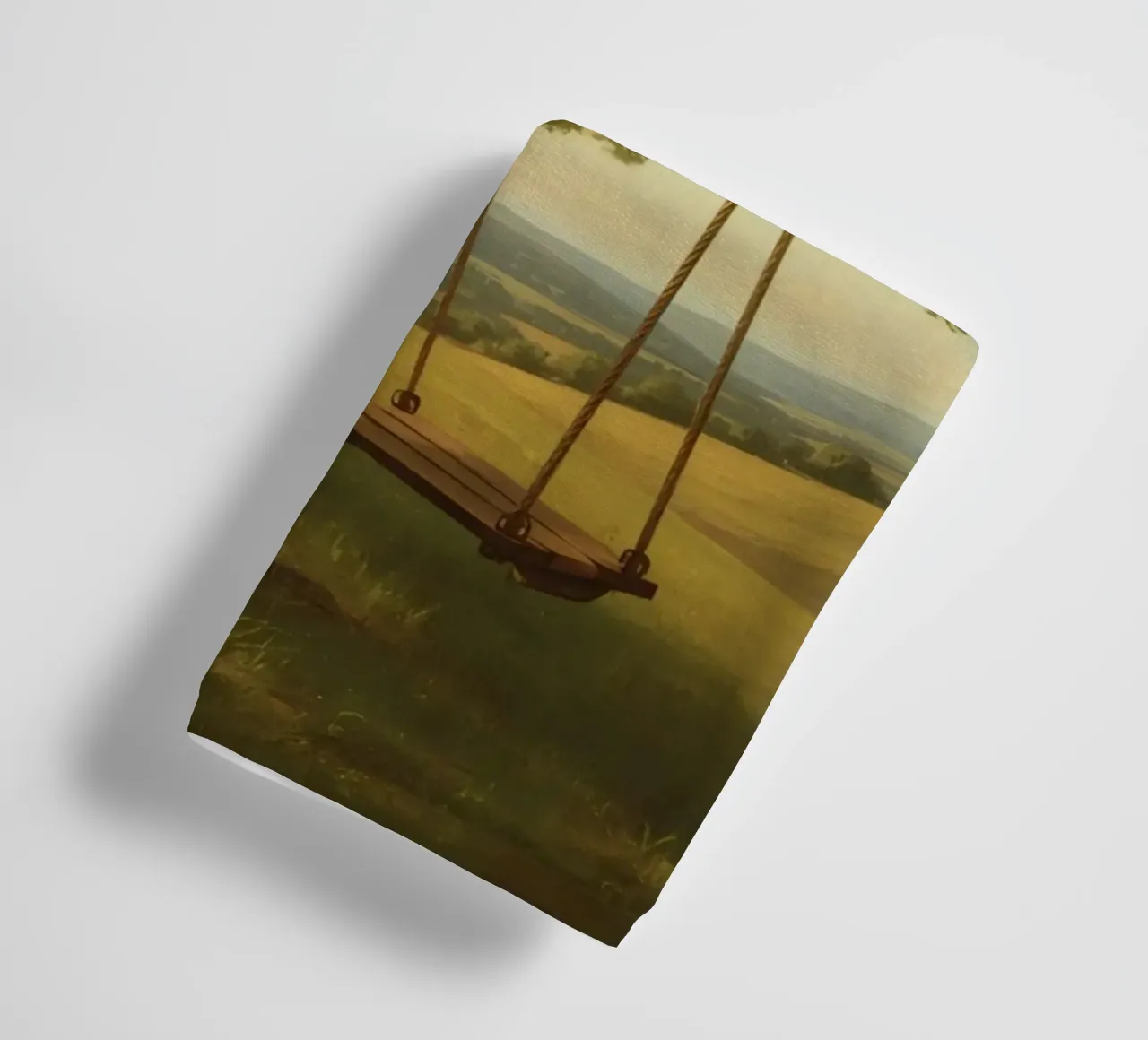 Swing hanging from a large tree overlooking rolling hills towel by DesignDoodle
