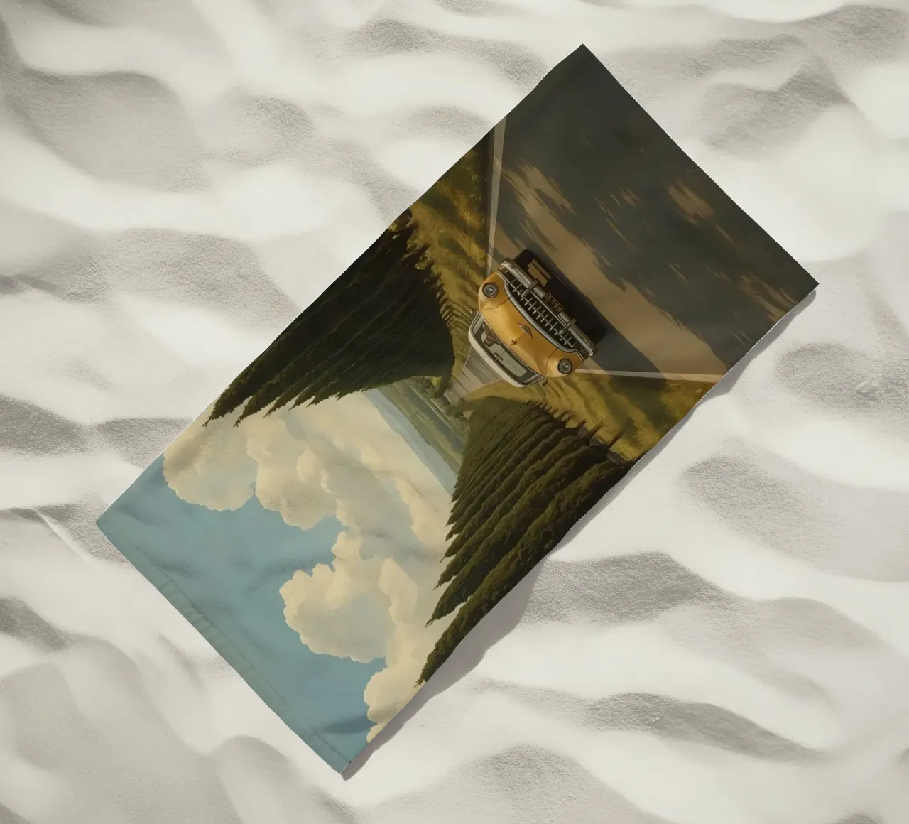 Oldtimer fährt unter bewölktem Himmel eine Allee entlang Strandtuch von DesignDoodle