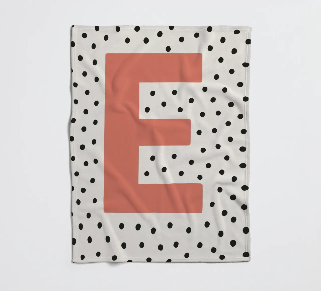 Initial E on dot pattern - Scandinavian style fleece blanket by KidzStudio