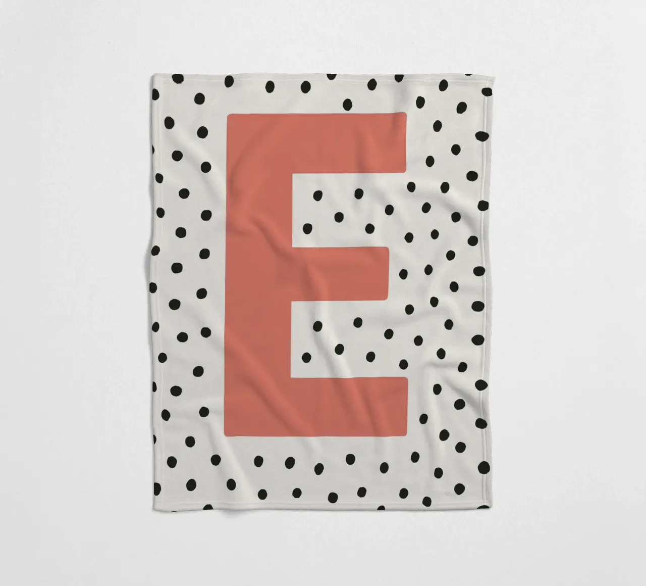 Initial E on dot pattern - Scandinavian style fleece blanket by KidzStudio