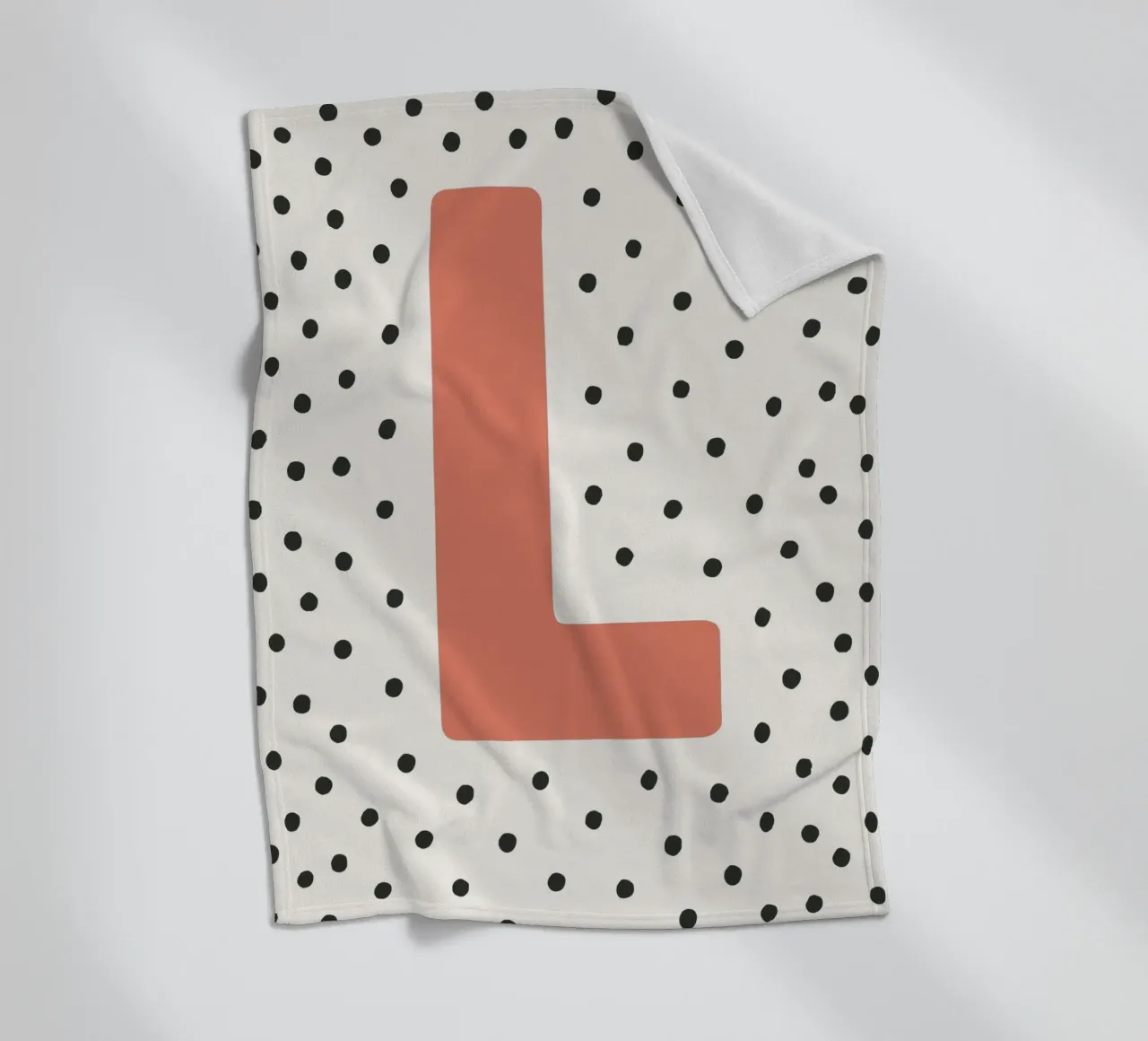 Initial L on dot pattern - Scandinavian style fleece blanket by KidzStudio