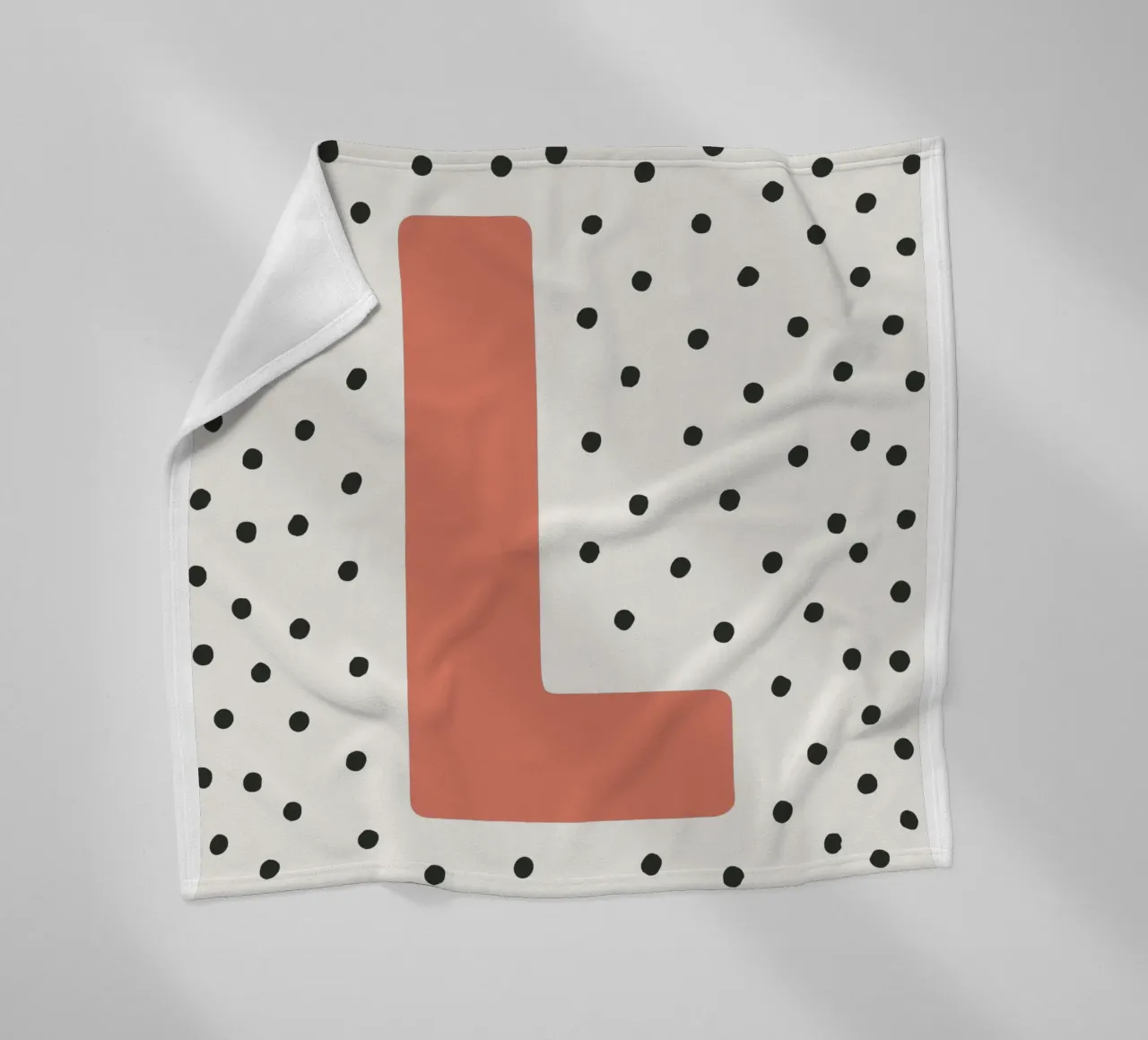 Initial L on dot pattern - Scandinavian style fleece blanket by KidzStudio